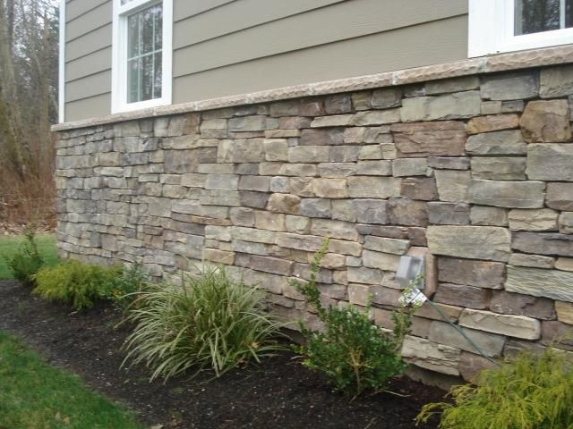 Stone veneer wall on a residential foundation